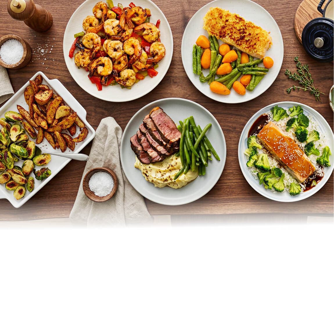 Suvie Kitchen Robot with roasted chicken, vegetables, and dessert